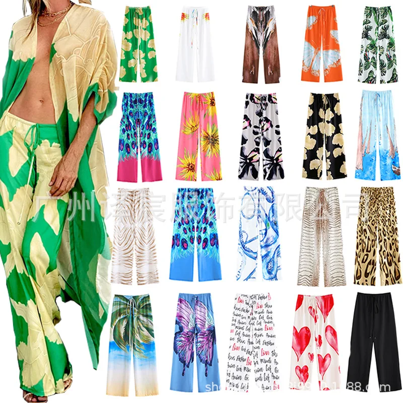 2022 new women casual pants spring and summer women printed elastic waist loose wide leg pants 
2022 new women casual pants spring and summer women printed elastic waist loose wide leg pants