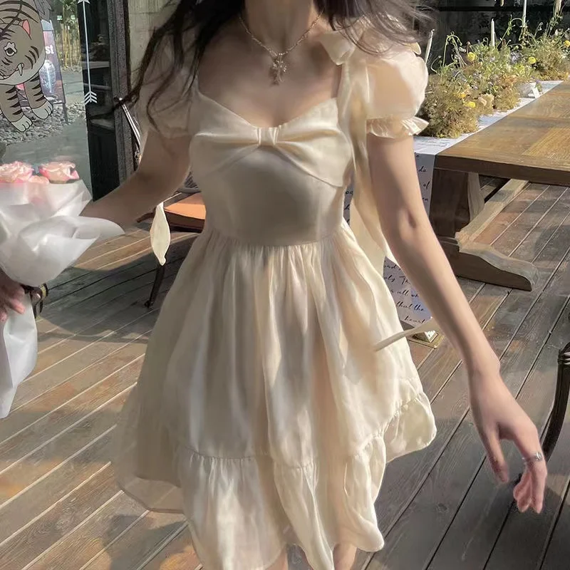 2023 Summer Sweet Puff Sleeve Fairy Dress Women Bow Vintage Casual Princess Mini Dress Female Solid Japanese Kawaii Party Dresss
2023 Summer Sweet Puff Sleeve Fairy Dress Women Bow Vintage Casual Princess Mini Dress Female Solid Japanese Kawaii Party Dresss