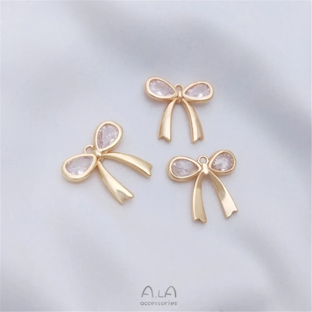 14K gold inlaid water drop zircon bow pendant DIY necklace pendant earring clasp pendant
14K gold inlaid water drop zircon bow pendant DIY necklace pendant earring clasp pendant