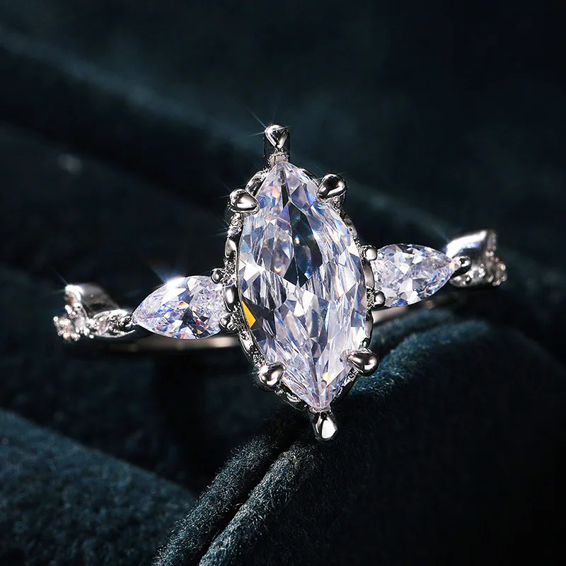 New Trendy Silver Plated Marquise Crystal Rings For Women Shine White CZ Stone Inlay Fashion Jewelry Wedding Party Gift Ring
New Trendy Silver Plated Marquise Crystal Rings For Women Shine White CZ Stone Inlay Fashion Jewelry Wedding Party Gift Ring