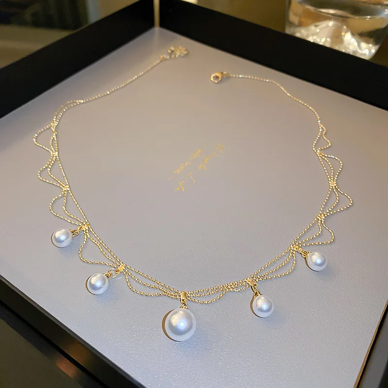 2022 Korean New Trendy Gold Plated Chain Pearl Tassel Necklace For Women Fashion Bijoux Choker Jewelry Party
2022 Korean New Trendy Gold Plated Chain Pearl Tassel Necklace For Women Fashion Bijoux Choker Jewelry Party