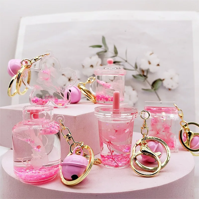 Creative Acrylic Dried Flowers into the Oil Floating Quicksand Liquid Keychain Pink Eternal Flowers Bag Pendant Gift Wholesale 
Creative Acrylic Dried Flowers into the Oil Floating Quicksand Liquid Keychain Pink Eternal Flowers Bag Pendant Gift Wholesale