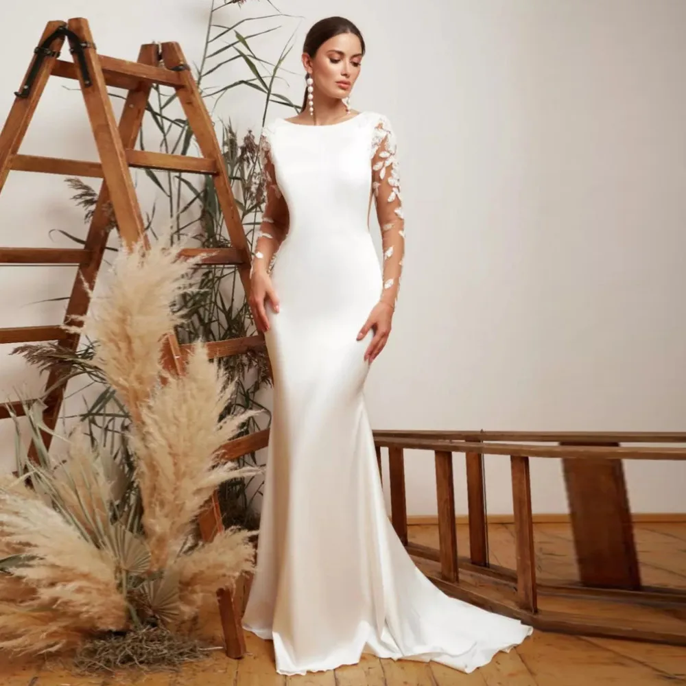 Mermaid Wedding Dresses With Long Sleeves Lace Appliques Backless For Bride Sweep Train Custom Made Bridal Gown Buttons
Mermaid Wedding Dresses With Long Sleeves Lace Appliques Backless For Bride Sweep Train Custom Made Bridal Gown Buttons