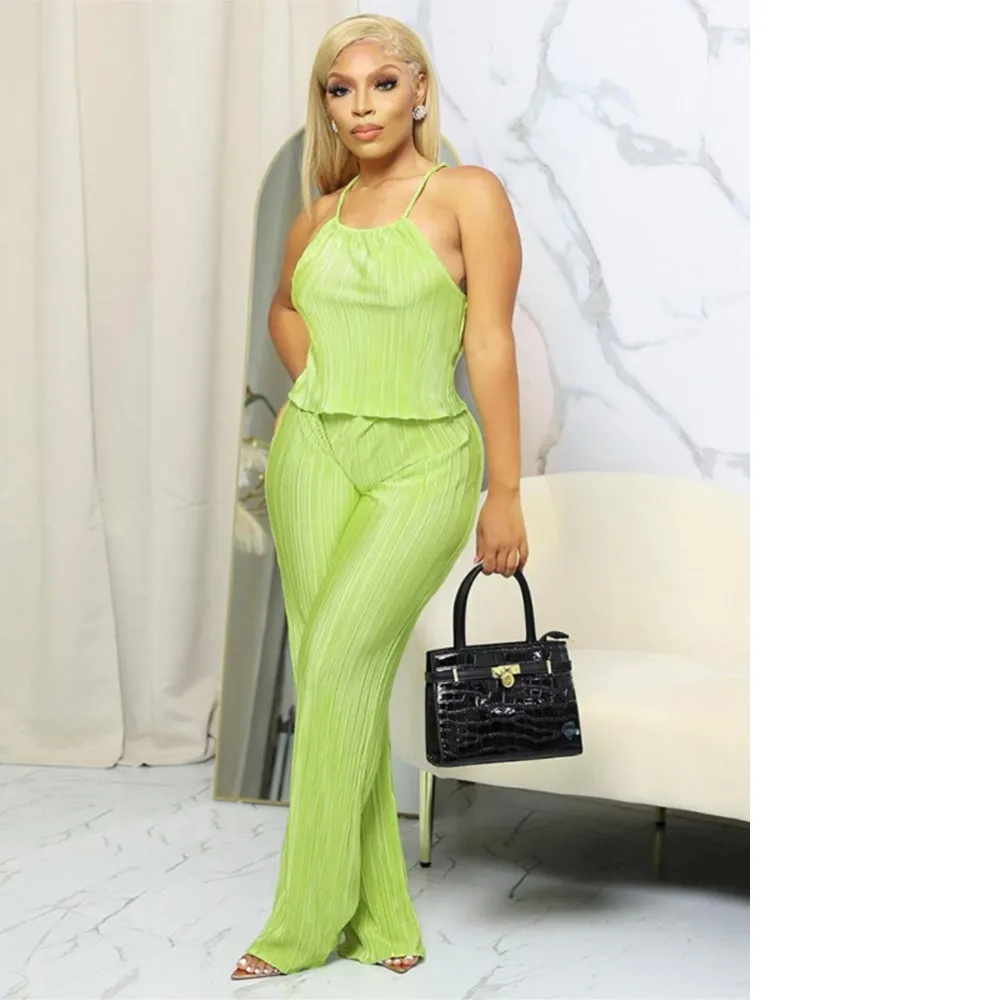 Женский костюм из двух предметов, однотонный пикантный топ с лямкой на шее, элегантные модные свободные брюки со складками и широкими штанинами, летний комплект из двух предметов
Женский костюм из двух предметов, однотонный пикантный топ с лямкой на шее, элегантные модные свободные брюки со складками и широкими штанинами, летний комплект из двух предметов