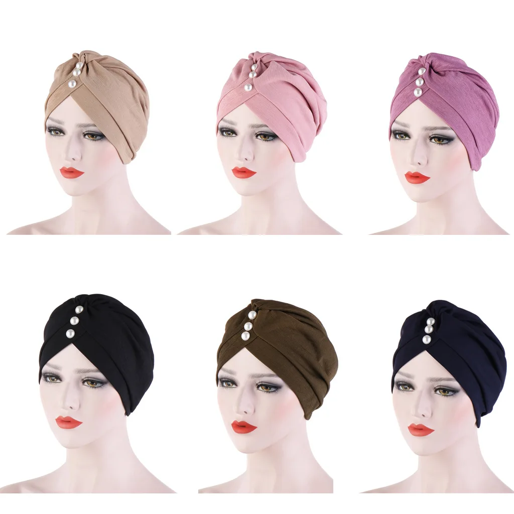 European and American new turban pure color forehead folds pearl Muslim toe cap Indian hat
European and American new turban pure color forehead folds pearl Muslim toe cap Indian hat