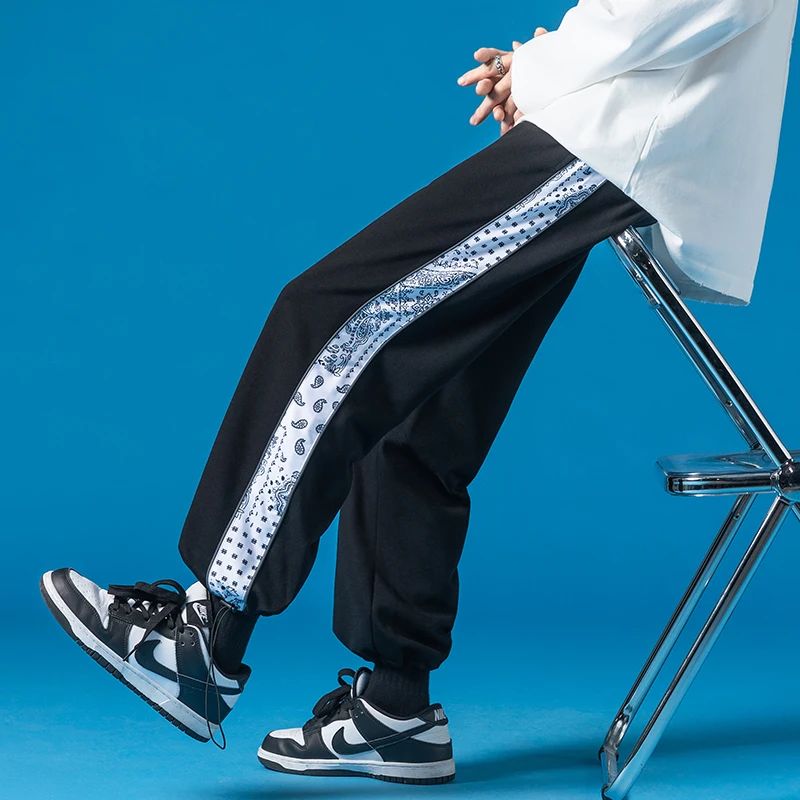 2022 spring brand cashew flower stitching boys girls loose Korean pants with reflective strips men's high street pants
2022 spring brand cashew flower stitching boys girls loose Korean pants with reflective strips men's high street pants