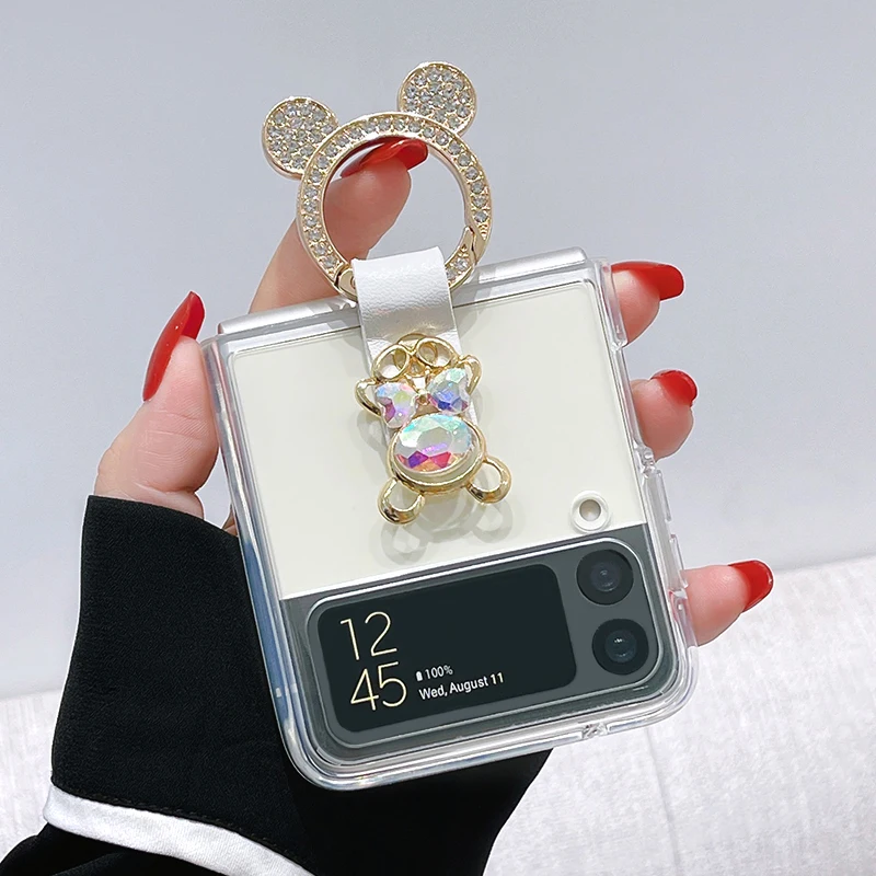 Fashion Cute Laser Bow Bear Diamond Ring Holder Clear Phone Case For Samsung Galaxy Z Flip 3 4 Flip3 Flip4 5G Shockproof Cover
Fashion Cute Laser Bow Bear Diamond Ring Holder Clear Phone Case For Samsung Galaxy Z Flip 3 4 Flip3 Flip4 5G Shockproof Cover
