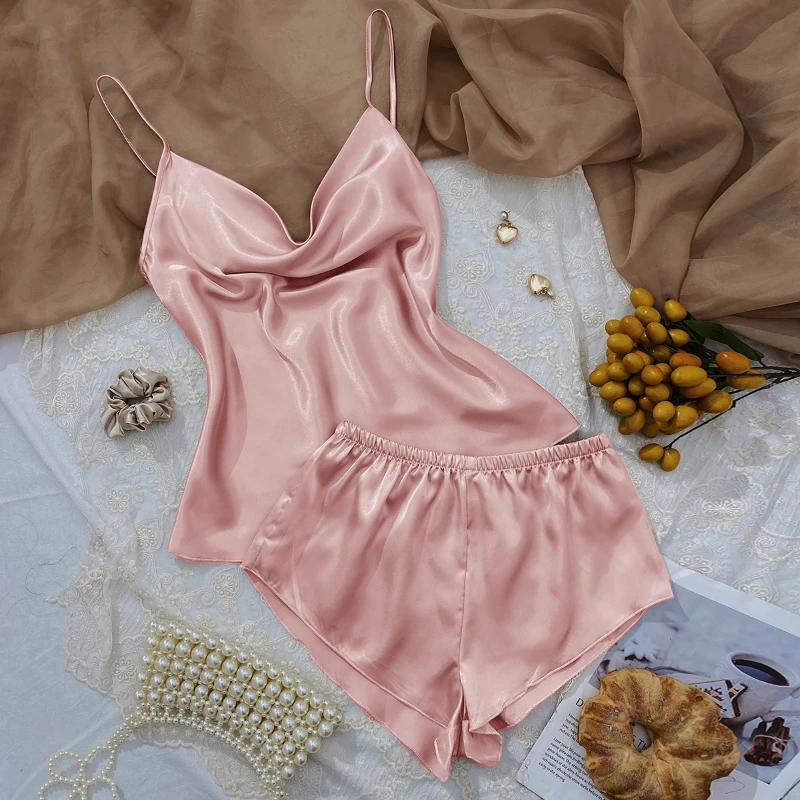 Solid Color Ice Silk Sleeveless Sexy Pijamas Women Thin Home Pijama Set Suspenders Shorts Suit Thin Two-piece Home Clothes
Solid Color Ice Silk Sleeveless Sexy Pijamas Women Thin Home Pijama Set Suspenders Shorts Suit Thin Two-piece Home Clothes