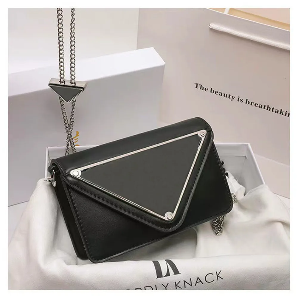 2022 New Luxury Black Designer Triangle Leather Bag Sports One Shoulder High Quality Casual Tote Small Triangle Messenger Bag
2022 New Luxury Black Designer Triangle Leather Bag Sports One Shoulder High Quality Casual Tote Small Triangle Messenger Bag