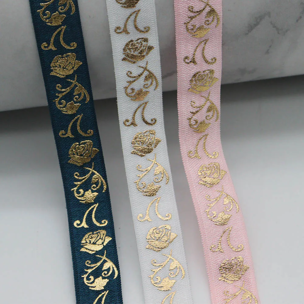 5/8" 15MM Gold Foil Valentine's Day Rose Printed Fold Over Elastic FOE Ribbon For DIY Hairband Gift Packing Decorations
5/8" 15MM Gold Foil Valentine's Day Rose Printed Fold Over Elastic FOE Ribbon For DIY Hairband Gift Packing Decorations