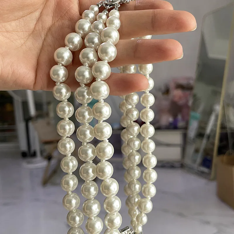 Three Layers High Gloss Pearl Rhinestone Stone Necklace Clavicle Chain Retro Saturn Necklace Wedding Jewelry Accessories Gift
Three Layers High Gloss Pearl Rhinestone Stone Necklace Clavicle Chain Retro Saturn Necklace Wedding Jewelry Accessories Gift