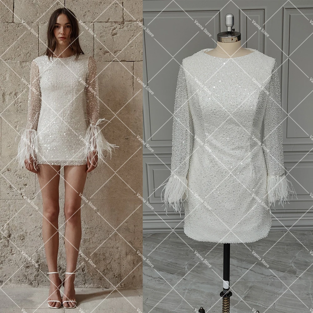 Custom Made Mini Length Sequined Bling Summer Wedding Dress Long Sleeves Feathers Above Knee Beading Tulle Luxury Bridal Gowns
Custom Made Mini Length Sequined Bling Summer Wedding Dress Long Sleeves Feathers Above Knee Beading Tulle Luxury Bridal Gowns
