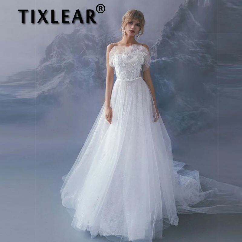 TIXLEAR A-Line Tulle Wedding Dresses for Women2023 Hand-made Flowers Open Back Covered Button Beach Bridal Gown Vestido De Noiva
TIXLEAR A-Line Tulle Wedding Dresses for Women2023 Hand-made Flowers Open Back Covered Button Beach Bridal Gown Vestido De Noiva