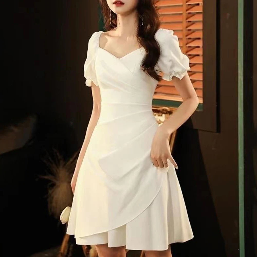 Fashion Women French Retro Short Sleeve Dress Elastic Waist Elegant V Neck Skirt White Pleated Puff Sleeve Party Clubwear
Fashion Women French Retro Short Sleeve Dress Elastic Waist Elegant V Neck Skirt White Pleated Puff Sleeve Party Clubwear