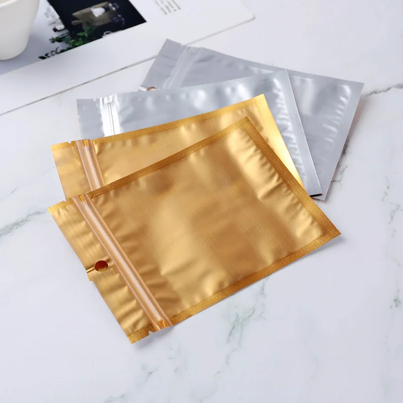 50Pcs Gold Aluminum Foil Self Sealing Bag Clear Frosted Surface Electronic Products Zipper Packing Bag Jewelry Storage Package
50Pcs Gold Aluminum Foil Self Sealing Bag Clear Frosted Surface Electronic Products Zipper Packing Bag Jewelry Storage Package