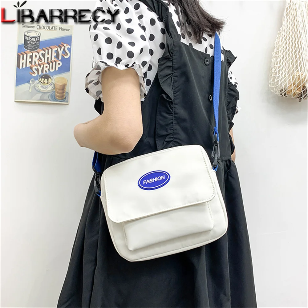 Solid Color Mini Ladies Shoulder Bag Quality Nylon New Women Messenger Bags 2023 Fashion Women's Mobile Phone Bag Wallet Bolsos
Solid Color Mini Ladies Shoulder Bag Quality Nylon New Women Messenger Bags 2023 Fashion Women's Mobile Phone Bag Wallet Bolsos