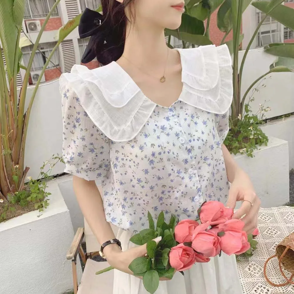 Blouse Doll Collar Bubble Short-sleeved Shirt Women's Summer French Bow Loose Cover Belly Floral Top Summer 2022 New Japan Korea
Blouse Doll Collar Bubble Short-sleeved Shirt Women's Summer French Bow Loose Cover Belly Floral Top Summer 2022 New Japan Korea