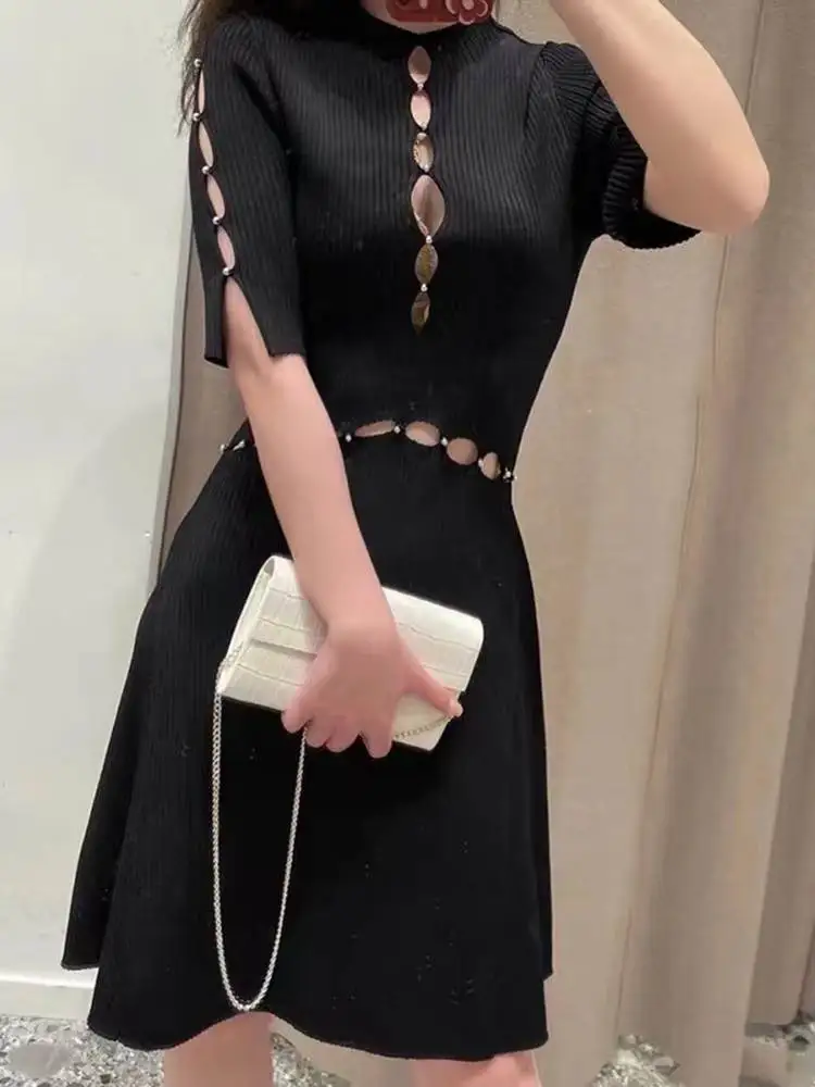 2022 Spring and Summer New Half-sleeve Black Hollow Knitted Women Dress Mini Dress
2022 Spring and Summer New Half-sleeve Black Hollow Knitted Women Dress Mini Dress