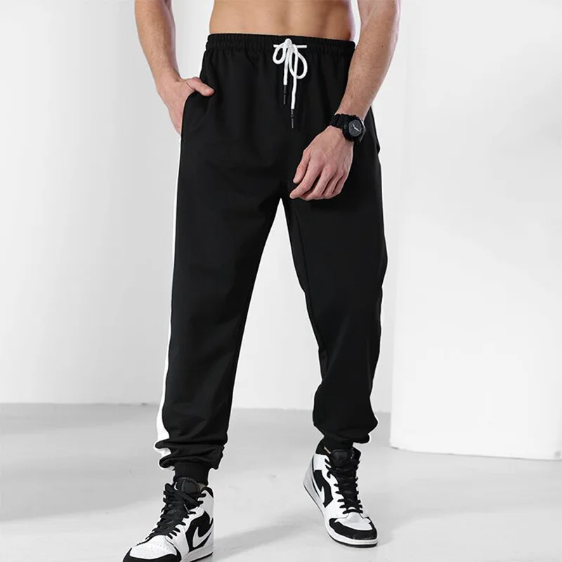 Men Sports Pants Spring Summer Loose Striped Pocket Outdoor Running Pants Korean Men's Lace-up Mid-Waist Pencil Pants Trousers
Men Sports Pants Spring Summer Loose Striped Pocket Outdoor Running Pants Korean Men's Lace-up Mid-Waist Pencil Pants Trousers