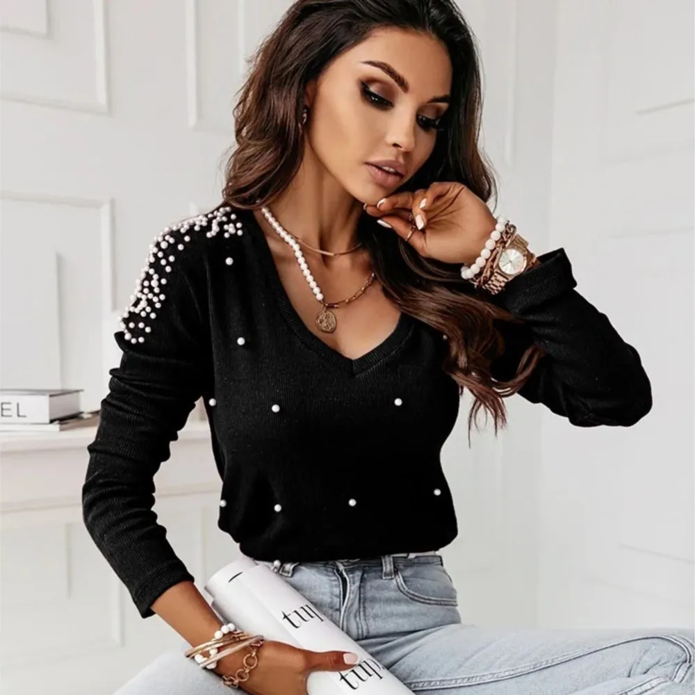 2023 Autumn New V-neck Beading Solid T-shirts Women Fashion Pullover Tops Korean Style Ladies Elegant Long Sleeve Simple Blouse
2023 Autumn New V-neck Beading Solid T-shirts Women Fashion Pullover Tops Korean Style Ladies Elegant Long Sleeve Simple Blouse