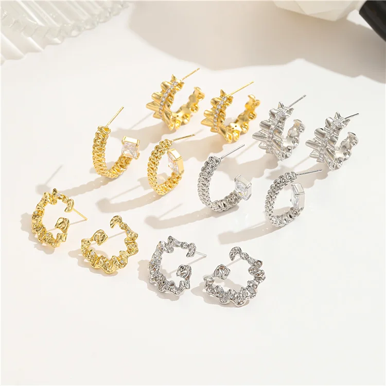 French simple pleated trend metal style texture 925 silver stud earrings for women micro-set zircon double C earrings
French simple pleated trend metal style texture 925 silver stud earrings for women micro-set zircon double C earrings