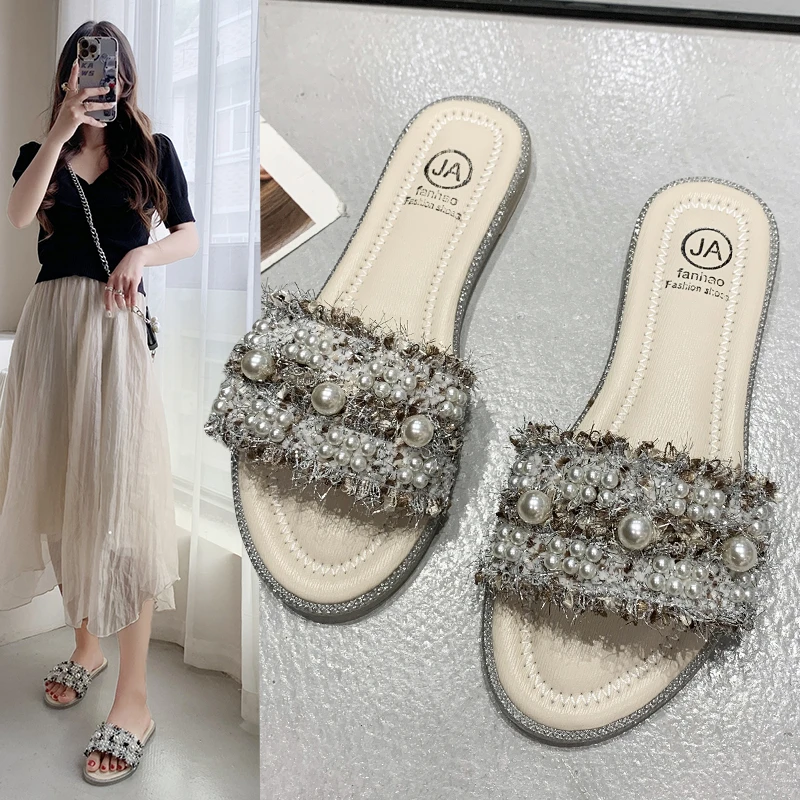 Sandals and Slippers Women Wear All-match Flat Bottom Seaside Women's Vacation Style Beach Pearl One-word Slippers In Summer
Sandals and Slippers Women Wear All-match Flat Bottom Seaside Women's Vacation Style Beach Pearl One-word Slippers In Summer