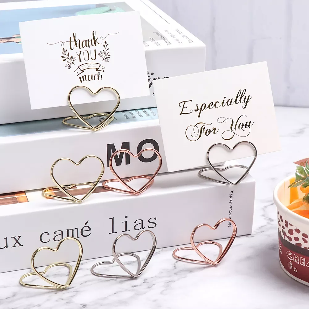 1PC Romantic Metallic Heart Shape Ring Place Card Photos Paper Clamp Clips Table Numbers Holder Party Desktop Decoration Supply 
1PC Romantic Metallic Heart Shape Ring Place Card Photos Paper Clamp Clips Table Numbers Holder Party Desktop Decoration Supply