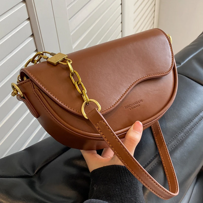 Designer Women's Leather Underarm Tote Bags Luxury Solid Color Small Moon Shoulder Crossbody Bags for Women Purses and Handbags 
Designer Women's Leather Underarm Tote Bags Luxury Solid Color Small Moon Shoulder Crossbody Bags for Women Purses and Handbags