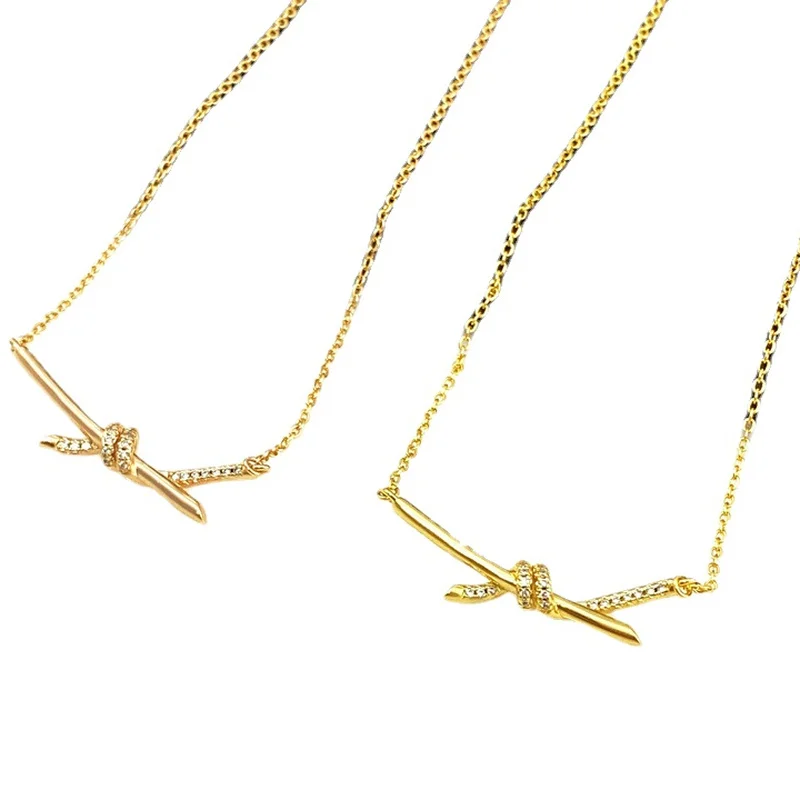 New Bow With Rhinestone Stone CZ Knotted Necklace Female Rose Gold Plated Women Necklace
New Bow With Rhinestone Stone CZ Knotted Necklace Female Rose Gold Plated Women Necklace