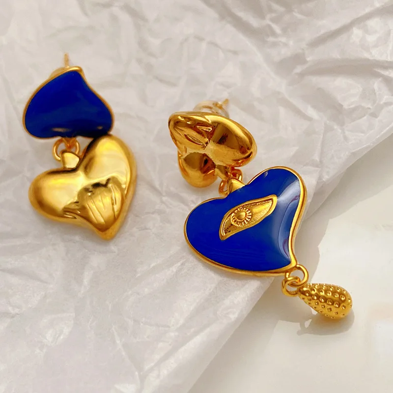European, American and French Style Vintage Brass Gold Plated Blue Enamel Women's Long Angel of Love Eye Asymmetric Earrings
European, American and French Style Vintage Brass Gold Plated Blue Enamel Women's Long Angel of Love Eye Asymmetric Earrings