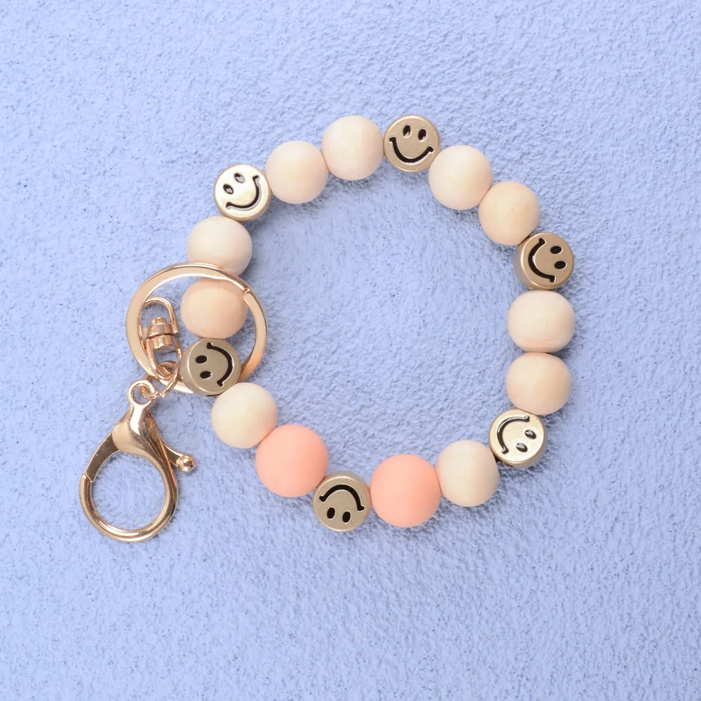 2022 New Design Cute Smiley Beaded Wood Wristlet bracelet Keychain Charming Bangle Elastic Friendship Keyring Party Jewelry Gift
2022 New Design Cute Smiley Beaded Wood Wristlet bracelet Keychain Charming Bangle Elastic Friendship Keyring Party Jewelry Gift