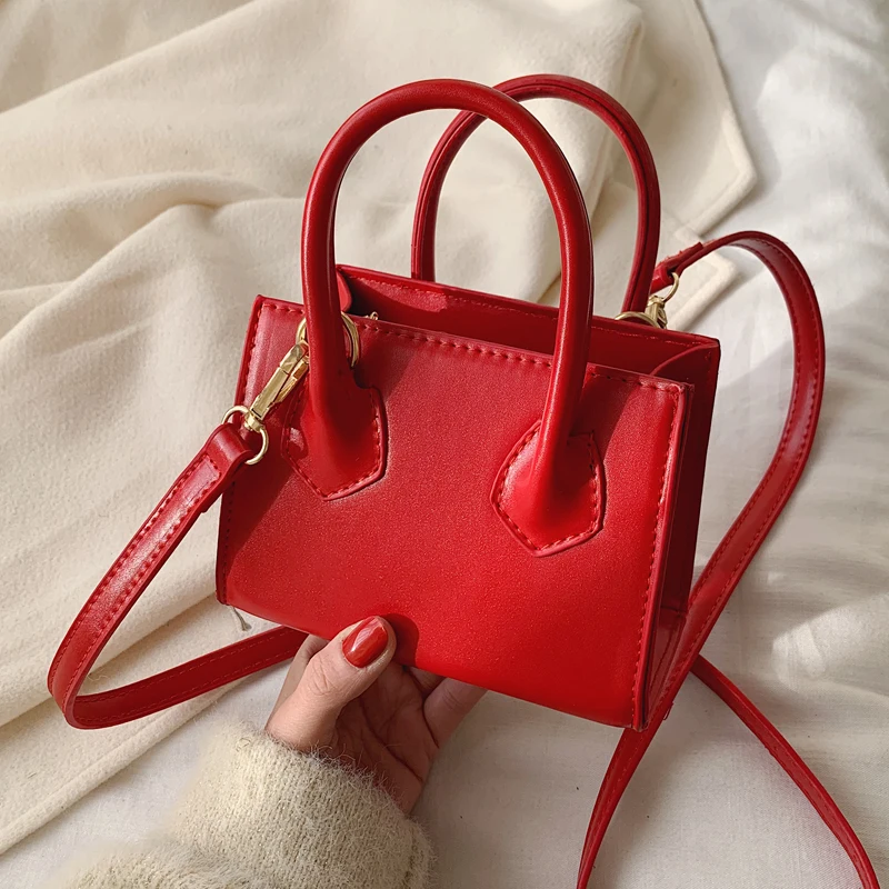 Solid color Mini Square Tote bag 2021 Fashion New High quality PU Leather Women's Designer Handbag Lovely Shoulder Messenger Bag
Solid color Mini Square Tote bag 2021 Fashion New High quality PU Leather Women's Designer Handbag Lovely Shoulder Messenger Bag