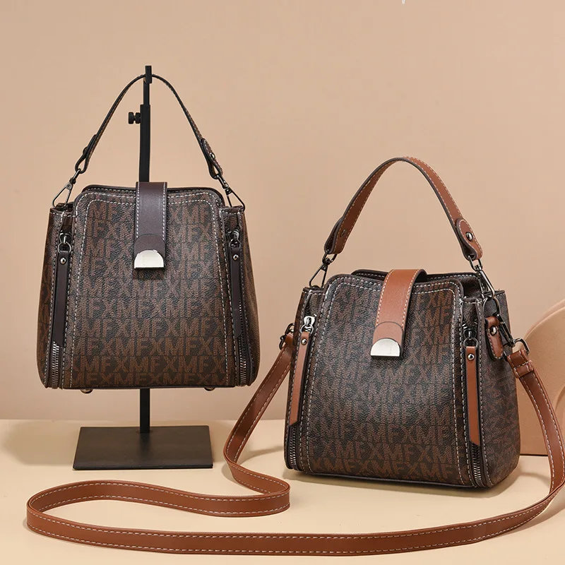 High Quality Leather Women Bucket Shoulder Bags Lock Buckle Tote Bag Casual Ladies Messenger Bag Versatile Handheld Women's Bag
High Quality Leather Women Bucket Shoulder Bags Lock Buckle Tote Bag Casual Ladies Messenger Bag Versatile Handheld Women's Bag
