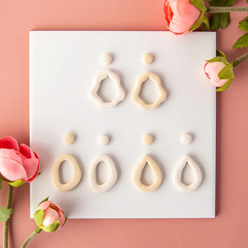 Creative Irregular Shaped Soft Polymer Clay Mold Geometric Handmade Earring Jewelry Pendant Cutter Clay Tools Cake Decorations
Creative Irregular Shaped Soft Polymer Clay Mold Geometric Handmade Earring Jewelry Pendant Cutter Clay Tools Cake Decorations