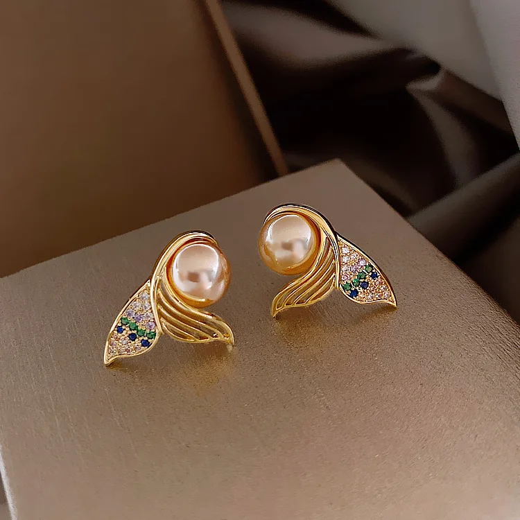 925 Silver Needle Female Earrings Korean Mermaid Tail Pearl Hollowed-Out Colorful Crystals Personality All-Match Jewelry
925 Silver Needle Female Earrings Korean Mermaid Tail Pearl Hollowed-Out Colorful Crystals Personality All-Match Jewelry