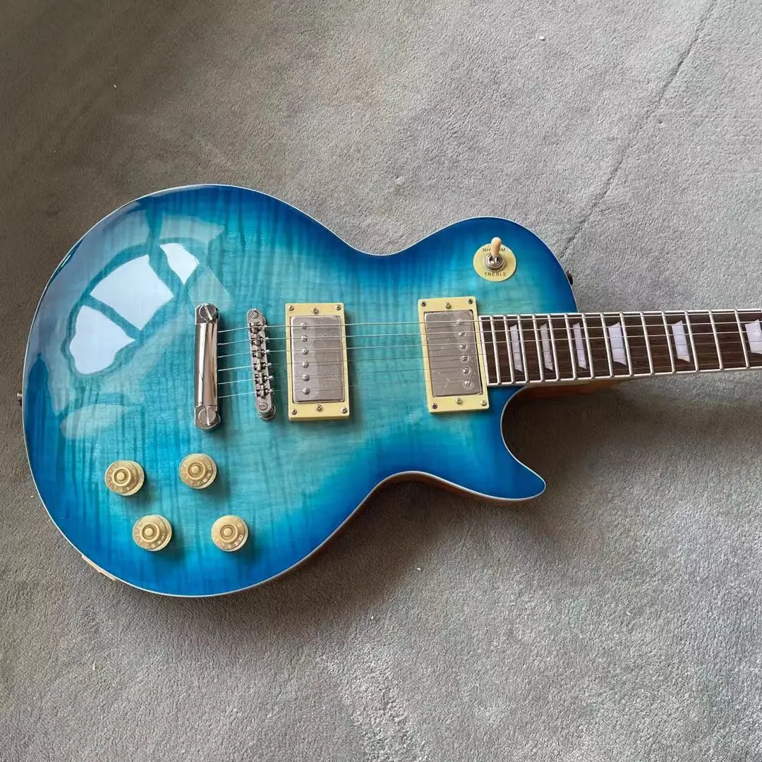 Custom Standard electric guitar rosewood fingerboard Blue color tiger flame top mahogany body gitaar
Custom Standard electric guitar rosewood fingerboard Blue color tiger flame top mahogany body gitaar