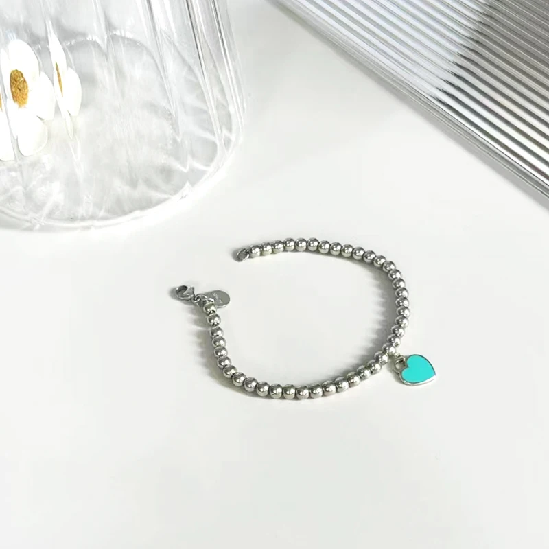 High quality 100% 925 sterling silver mini heart shaped 4mm bead bracelet for women luxury jewelry Christmas gift
High quality 100% 925 sterling silver mini heart shaped 4mm bead bracelet for women luxury jewelry Christmas gift