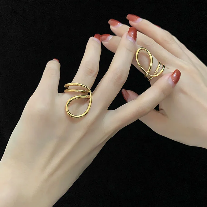 New Trend Creative Irregular Personality Gold Silver Color Metal Line Exaggerated Big Opening Adjust Finger Rings For Women Men
New Trend Creative Irregular Personality Gold Silver Color Metal Line Exaggerated Big Opening Adjust Finger Rings For Women Men