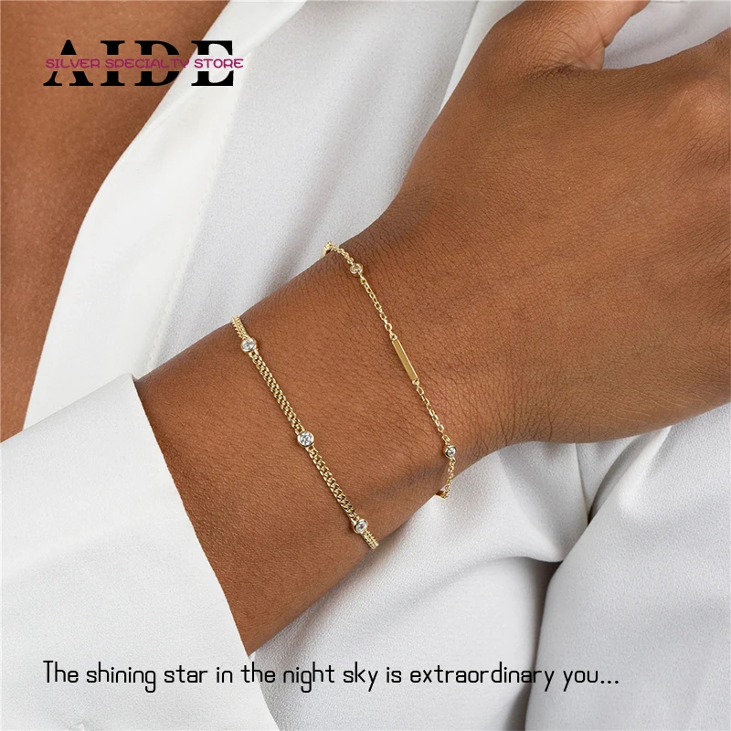 AIDE 925 Sterling Silver Five White Zircon 18k Gold Bracelet Chain for Women's Girl's Luxury Fine Jewelry Gifts Bangles Pulseras
AIDE 925 Sterling Silver Five White Zircon 18k Gold Bracelet Chain for Women's Girl's Luxury Fine Jewelry Gifts Bangles Pulseras