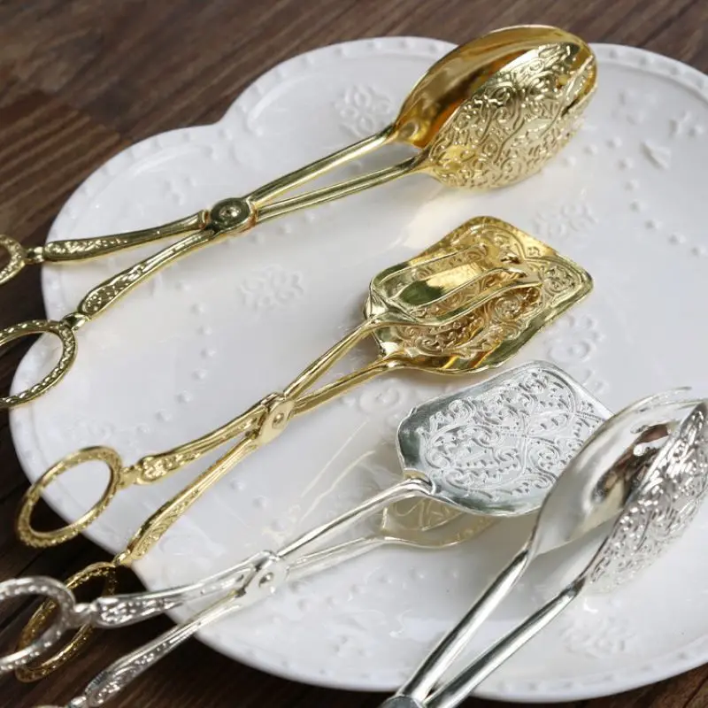 Food Tongs Kitchen Tools Salad Bread Pastry Barbecue Tools Salad And Fruit Kitchen Utensils Gilded Cake Tongs
Food Tongs Kitchen Tools Salad Bread Pastry Barbecue Tools Salad And Fruit Kitchen Utensils Gilded Cake Tongs