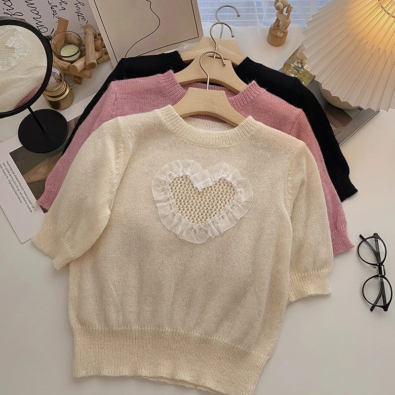 Женский трикотажный пуловер с круглым вырезом и коротким рукавом 
Женский трикотажный пуловер с круглым вырезом и коротким рукавом