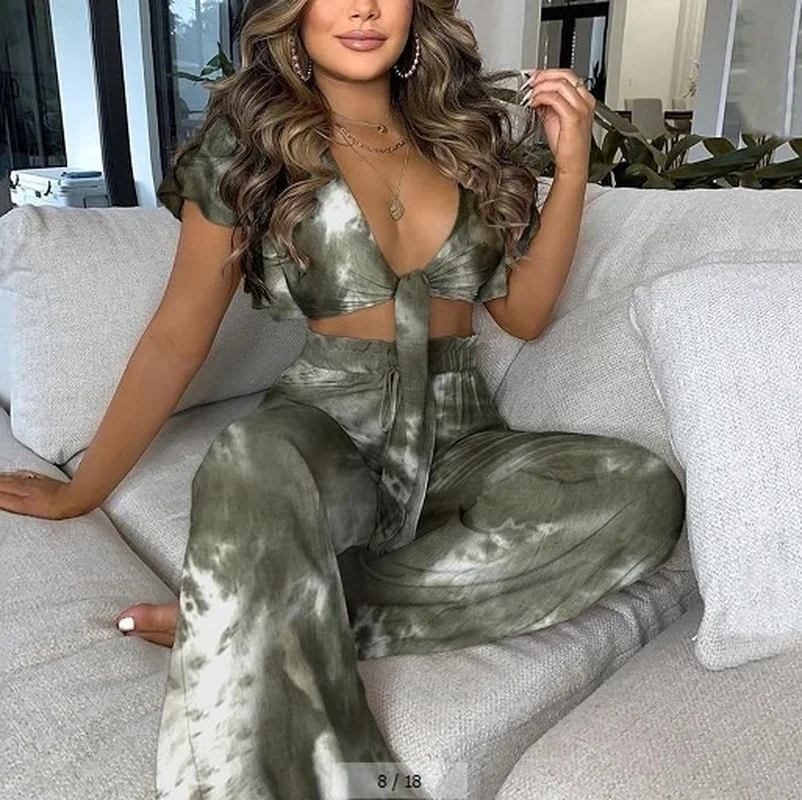 Ladies Casual V-neck Lace-sleeved Short Lace-up Top + High-waist Wide-leg Trousers Fashion Sexy Printed Beach Two-piece Suit
Ladies Casual V-neck Lace-sleeved Short Lace-up Top + High-waist Wide-leg Trousers Fashion Sexy Printed Beach Two-piece Suit