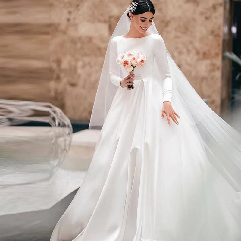 New Arrival Jewel Collar Long Sleeves Satin Wedding Dresses Custom made Simple Design Bride Dress
New Arrival Jewel Collar Long Sleeves Satin Wedding Dresses Custom made Simple Design Bride Dress