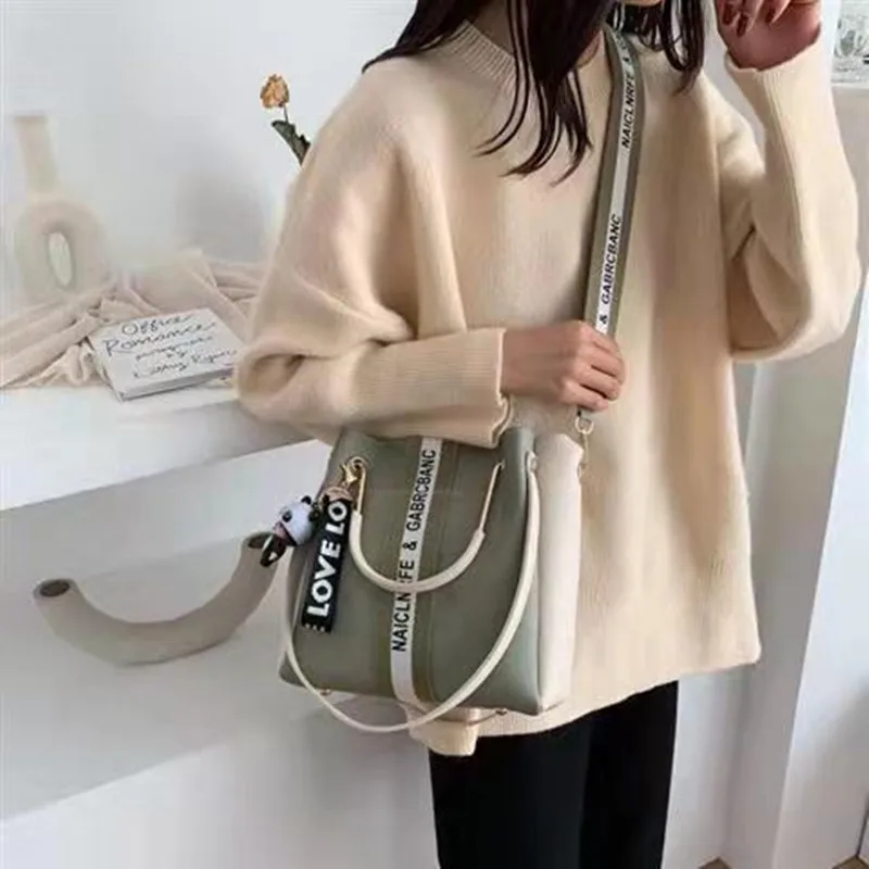 Large-Capacity Canvas Bag Female 2022 New Japanese Harajuku Hand-Held Large Bag Campus Student One-Shoulder Messenger Bag
Large-Capacity Canvas Bag Female 2022 New Japanese Harajuku Hand-Held Large Bag Campus Student One-Shoulder Messenger Bag