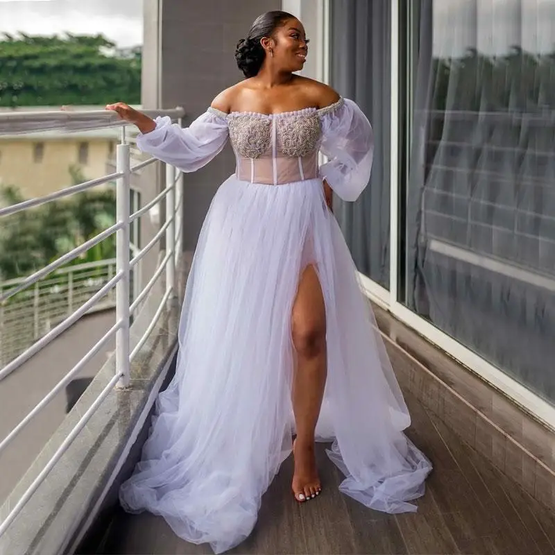African Off The Shoulder A Line Wedding Dresses Lace Appliques See Through Puffy Long Sleeves Bridal Gowns High Split Vestidos
African Off The Shoulder A Line Wedding Dresses Lace Appliques See Through Puffy Long Sleeves Bridal Gowns High Split Vestidos