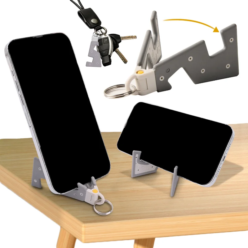 Portable Phone Holder Foldable Desktop Mobile Phone Bracket with Keychain Universal Fixed Laptop Phone Stand for Iphone Samsung
Portable Phone Holder Foldable Desktop Mobile Phone Bracket with Keychain Universal Fixed Laptop Phone Stand for Iphone Samsung