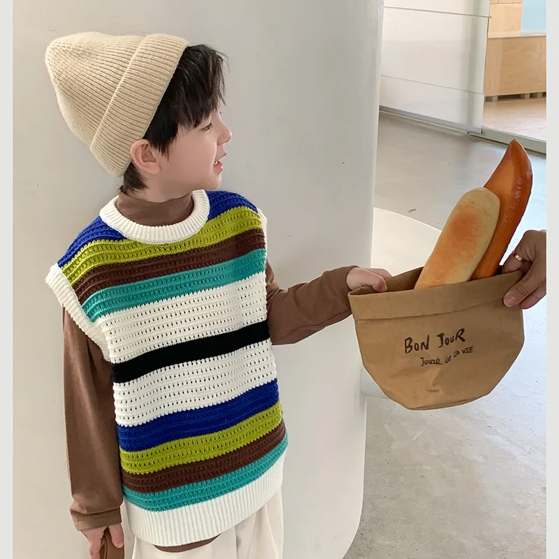 Kids sweater 2023 preppy style children hollow out knitwear boys round neck loose knit Vest girls Tops
Kids sweater 2023 preppy style children hollow out knitwear boys round neck loose knit Vest girls Tops