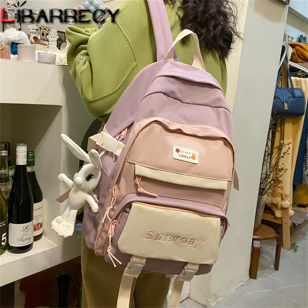 Panelled Designer High Quality Nylon Women's Backpack Cute Pendant Design Fashion Student School Bag Teen Laptop Backpack Bolsos
Panelled Designer High Quality Nylon Women's Backpack Cute Pendant Design Fashion Student School Bag Teen Laptop Backpack Bolsos