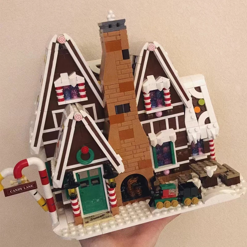 

Пряничный домик, идеи, кирпичи, игрушки, набор моделей с фигурками, 1477 шт. строительных блоков, Детский Рождественский подарок, зимняя деревня 10267