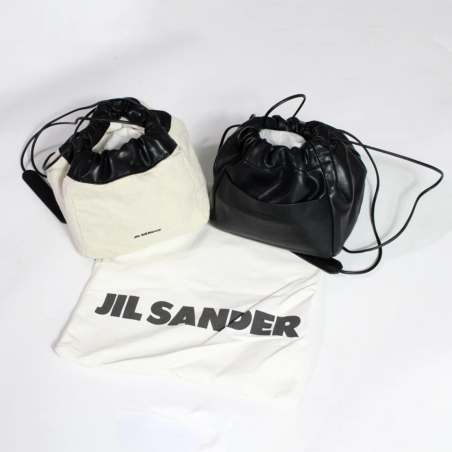 Сумка Jil sander для мужчин и женщин, кожаная холщовая двухсторонняя сумочка-мешок для пельменей, кросс-сумка из козьей кожи, косметичка
Сумка Jil sander для мужчин и женщин, кожаная холщовая двухсторонняя сумочка-мешок для пельменей, кросс-сумка из козьей кожи, косметичка